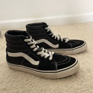 Lightly worn Black/True White Vans. Women’s size 7.0, Mens size 5.5.
